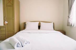 Elegant and Comfortable 2BR Puri Garden Apartment By Travelio
